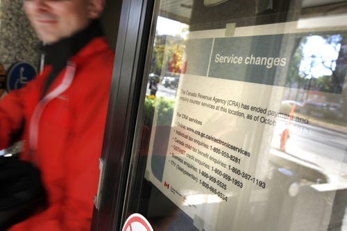 October 1, 2013 - 131001  -  Signage at the Canada Revenue Agency on Broadway says that they will no longer be providing personal counter service from Tuesday, October 1, 2013. (John Woods / WINNIPEG FREE PRESS)