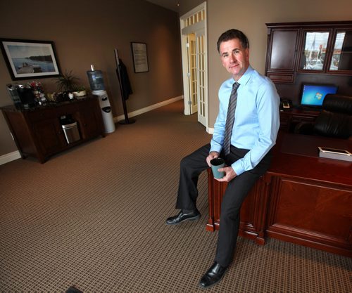 Kevin Sweryd, head of Bardal Funeral Home poses at their store front cremation arrangement office on St. Marys Road. Designed specifically for "cremation consumers" he said. See Randy Turner's tale. October1, 2013 - (Phil Hossack / Winnipeg Free Press)