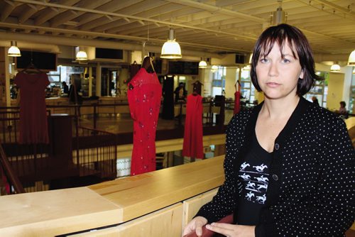 Canstar Community News Artist Jaime Black with her visual art installation The REDress Project, which is based on an aesthetic response to the more than 600 reported cases of missing and murdered Aboriginal women across Canada. The installation is currently on display at Neechi Commons on Main Street.