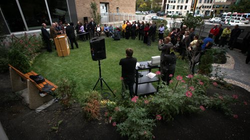 Guests circulate around a newly opened "green space" at the opening ceremony for Bab's Asper Lilac Garden at the U of W Thursday. See release/story. October 3, 2013 - (Phil Hossack / Winnipeg Free Press)