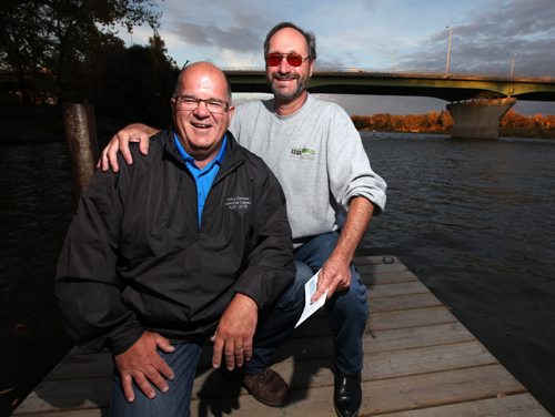 Paul Duncan (left) raised more than $8,000 in one day to help kids with cancer, poses with Jim Bais of fishing for a cure. See story. October 3, 2013 - (Phil Hossack / Winnipeg Free Press)