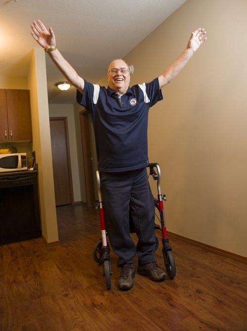 130410 Winnipeg - DAVID LIPNOWSKI / WINNIPEG FREE PRESS (October 04, 2013)  Rick Byquist is a paraplegic but is recovering with the help of the Paraplegic Association of Manitoba. He is seen walking in his home on Friday, something he didn't know he would ever be able to do again.  United Way story by Elizabeth Fraser story
