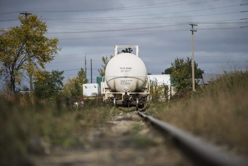 130410 Winnipeg - DAVID LIPNOWSKI / WINNIPEG FREE PRESS (October 04, 2013)  Signs of danger, flammable materials, hazardous materials, and railway cars in the Mission Industrial Neighbourhood due to the heavy industry in the area. For Aldo Santin story