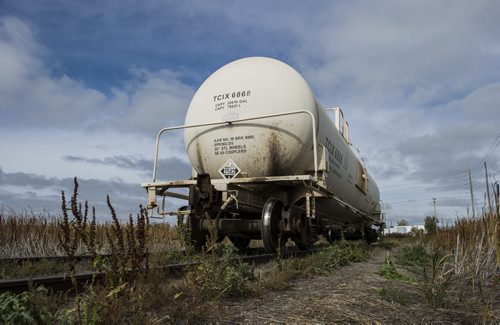 130410 Winnipeg - DAVID LIPNOWSKI / WINNIPEG FREE PRESS (October 04, 2013)  Signs of danger, flammable materials, hazardous materials, and railway cars in the Mission Industrial Neighbourhood due to the heavy industry in the area. For Aldo Santin story