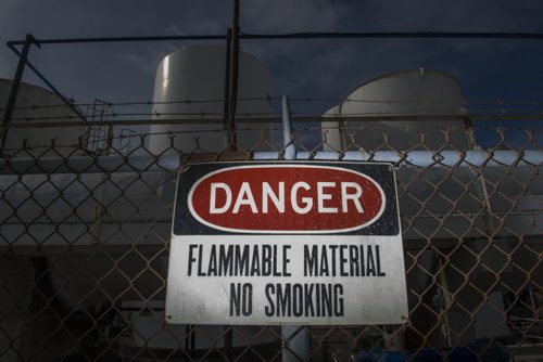 130410 Winnipeg - DAVID LIPNOWSKI / WINNIPEG FREE PRESS (October 04, 2013)  Signs of danger, flammable materials, hazardous materials, and railway cars in the Mission Industrial Neighbourhood due to the heavy industry in the area. For Aldo Santin story