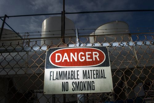 130410 Winnipeg - DAVID LIPNOWSKI / WINNIPEG FREE PRESS (October 04, 2013)  Signs of danger, flammable materials, hazardous materials, and railway cars in the Mission Industrial Neighbourhood due to the heavy industry in the area. For Aldo Santin story