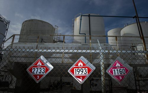 130410 Winnipeg - DAVID LIPNOWSKI / WINNIPEG FREE PRESS (October 04, 2013)  Signs of danger, flammable materials, hazardous materials, and railway cars in the Mission Industrial Neighbourhood due to the heavy industry in the area. For Aldo Santin story