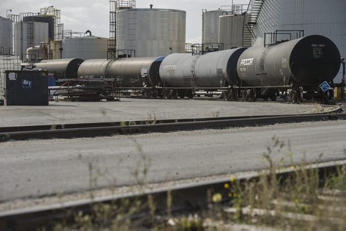 130410 Winnipeg - DAVID LIPNOWSKI / WINNIPEG FREE PRESS (October 04, 2013)  Signs of danger, flammable materials, hazardous materials, and railway cars in the Mission Industrial Neighbourhood due to the heavy industry in the area. For Aldo Santin story