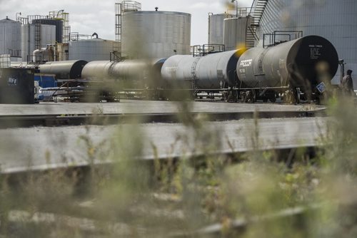 130410 Winnipeg - DAVID LIPNOWSKI / WINNIPEG FREE PRESS (October 04, 2013)  Signs of danger, flammable materials, hazardous materials, and railway cars in the Mission Industrial Neighbourhood due to the heavy industry in the area. For Aldo Santin story