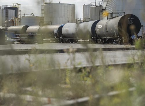 130410 Winnipeg - DAVID LIPNOWSKI / WINNIPEG FREE PRESS (October 04, 2013)  Signs of danger, flammable materials, hazardous materials, and railway cars in the Mission Industrial Neighbourhood due to the heavy industry in the area. For Aldo Santin story