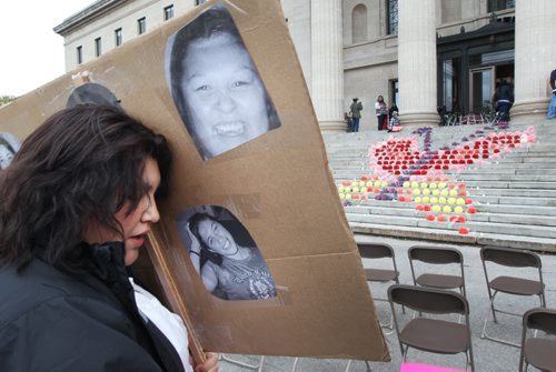 Supporter Kiana Sky at event for Missing and Murdered Aboriginal Women in Canada October 4, 2013 Winnipeg **Mamaway Kiskisitan Niwakomakanak - (Translation) We Gather to Remember our Relatives. Donated flowers to make the FLORAL BUTTERFLY dedication of the steps of the Legislative Building for our October 4, 2013 event honouring Missing and Murdered Women and their familiesStandup Photo- Oct 04, 2013   (JOE BRYKSA / WINNIPEG FREE PRESS)