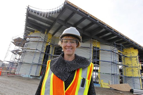 Living Water Columbarium's . Monique Gauthier poses at the new Catholic Church being built across from the Costco on Keniston. BORIS MINKEVICH / WINNIPEG FREE PRESS. Oct. 4, 2013