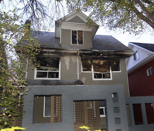 An overnight fire Tuesday damaged a house at 761 McMillan Ave.  Ashley Prest story. Wayne Glowacki / Winnipeg Free Press Oct. 8 2013