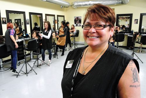 Glennis Valladares the Cosmetology instructor in her class at the Frontier Collegiate Institute in Cranberry Portage, Manitoba. 130917 - September 17, 2013 MIKE DEAL / WINNIPEG FREE PRESS