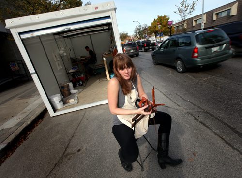 Chelsea Grant poses in front of her small shipping container on Sherbrook Street See Adam Wazney story. October 8, 2013 - (Phil Hossack / Winnipeg Free Press)