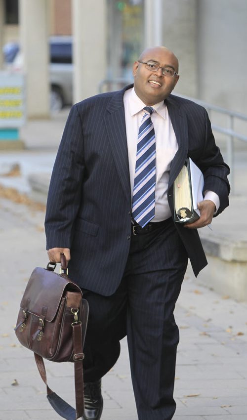 Immigration lawyer Bashir Khan heading to a has a refugee hearing Wednesday. Carol Sanders story. Wayne Glowacki / Winnipeg Free Press Oct. 9 2013
