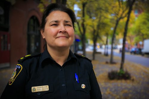 One of the first female Winnipeg Police Officers of Aboriginal descent Patrol Sgt. Edith Turner poses in the Exchange District. 131010 - Thursday, October 10, 2013 - (Melissa Tait / Winnipeg Free Press)