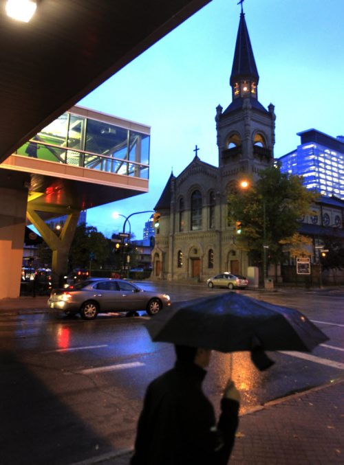 Rain drops began to fall in downtown Winnipeg Friday morning with more  showers expected. Wayne Glowacki / Winnipeg Free Press Oct. 11 2013