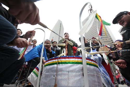 A large group of  drummers and jingle dancers gathered together at the corner of Portage and Main welcoming the UN Special Rapporteur on the Rights of Indigenous Peoples Saturday morning.  Oct   12,, 2013 Ruth Bonneville Winnipeg Free Press