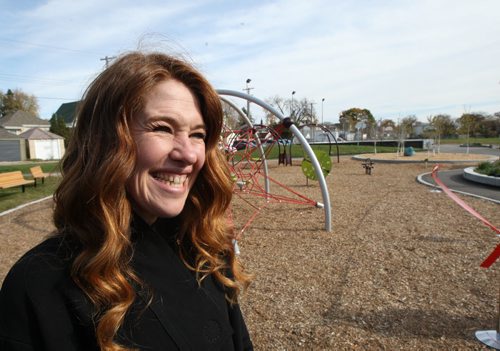 Olympic athlete Clara Hughes all smiles at the unveiling of the Clara Hughes Recreation Park which is now complete after a $758,500 redevelopment which includes new entry plaza, skate board pod, accessible playground and hockey skills area and much more- The development is close to residents heart as originally their community club at this location was demolished and funding was frozen by the city due to cutbacks- -See Mary Agnes Welch brief- Oct 15, 2013   (JOE BRYKSA / WINNIPEG FREE PRESS)