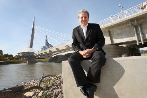 Dan Vandal near the Esplanade Riel pedestrian bridge and the Canadian Museum for Human Rights- He announced today that he will run in the next federal election for Liberal against St Boniface MP Shelly Gover  -See Bartley Kives story Oct 15, 2013   (JOE BRYKSA / WINNIPEG FREE PRESS)