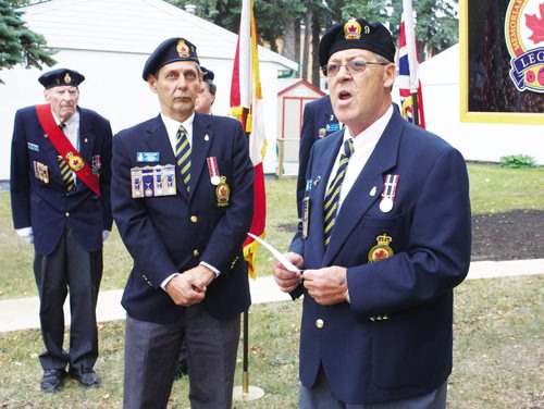 Canstar Community News Sept. 26, 2013 - Royal Canadian Legion Zone 64 zone commander George McCall speaks at a dedication for a sign at Canadian Legion Gardens on Sept. 26. (DAN FALLOON/CANSTAR COMMUNITY NEWS/HERALD)
