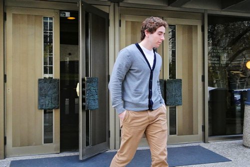 Jordan Loechner, Former HSC triage aide, leaves the Lawcourts building during the lunch break in the Brian Sinclair Inquiry.  131016 October 16, 2013 Mike Deal / Winnipeg Free Press