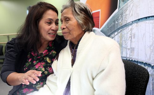 Fidencia David, 86, one of the last living  Comfort Woman survivors who was raped and taken captive by Japanese soldiers during the second world war talks to the media about her horrific experiences like they were yesterday at the Chinese Cultural Centre Thursday morning.  The Canadian Museum for Human Rights organized her visit to Winnipeg along with her therapist  Cristina Lope Rosello, a filipino therapist  to share her story on sexual slavery during the war. Fidencia David gets comforted by her therapist and long time friend Cristiana Lope Rosello after event.  See Carol Sanders story. Oct   17,, 2013 Ruth Bonneville / Winnipeg Free Press