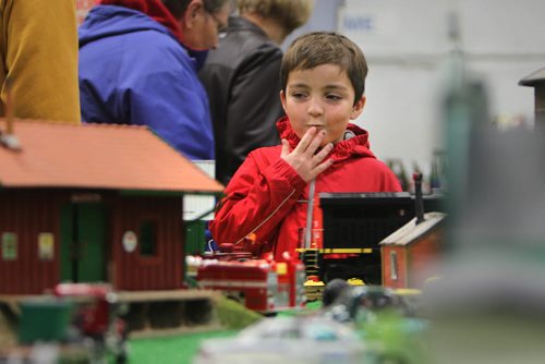 Seven year old Thomas Croall is excited as he watches "G" series model trains make their way around the tracks while attending the MB Mega Train Show at Canlan Sports Centre Saturday afternoon.  The show is on Saturday and Sunday till 5pm.   Standup photo  Oct   19,, 2013 Ruth Bonneville Winnipeg Free Press