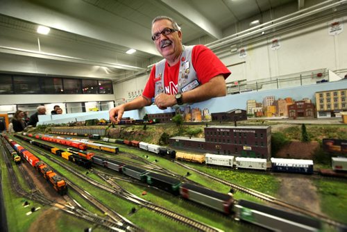 Ray Kindrat one of the original members of Win-N-Trak, series miniature train sets works on their clubs display at the  MB Mega Train Show at Canlan Sports Centre Saturday afternoon.  The show is on Saturday and Sunday till 5pm.   Standup photo  Oct   19,, 2013 Ruth Bonneville Winnipeg Free Press
