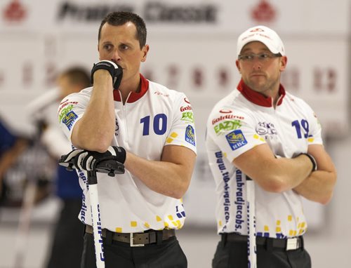 E.J. Harnden and Ryan Fry, of Team Jacobs look on in dismay during their game against Team Kean. They would go on to lose the match 5-4. October 20, 2013 Prairie Classic Curling. (GREG GALLINGER / WINNIPEG FREE PRESS)