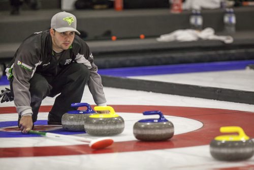 Travis Fanset, of Team Kean. The rocks are lined up in front of the button. Prairie Classic Curling. Oct. 20, 2013. GREG GALLINGER / WINNIPEG FREE PRESS