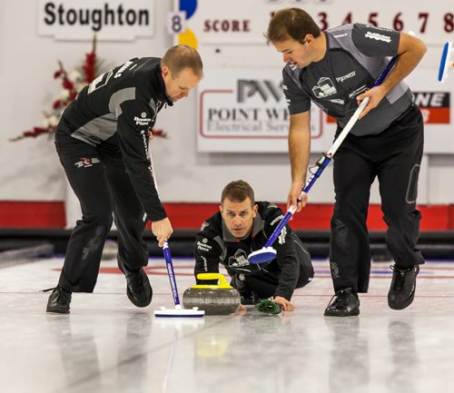 Mark Nichols and Reid Carruthers sweep while Jeff Stoughton follows his delivery. October 20, 2013 (GREG GALLINGER / WINNIPEG FREE PRESS)