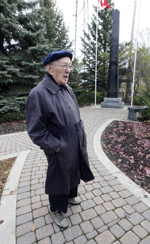 Ted Friesen was a conscientious objector while his brother fought in WW2 stand  near Altona cenotaph - Remembrance Day Feature Äì Mennonite soldiers  who joined the army during WW2 were shunned by their  community upon their return to Altona  after WW2 Äì they formed their own church Altona United Church  started in 1953  - Mennonite vets  -Randy Turner story  KEN GIGLIOTTI / Oct. 21 2013 / WINNIPEG FREE PRESS