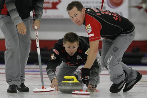 October 21, 2013 - 131021  -  Mike McEwen and lead Denni Neufeld look down the ice during the championship game against Glenn Howard in the 2013 Canad Inns Prairie Classic in Portage La Prairie Monday, October 21, 2013. John Woods / Winnipeg Free Press
