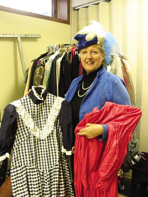 Canstar Community News Oct. 9, 2013 - Margaret Mills shows off some of the costumes that are being offered for sale following the end of the Headingley United Church Players theatre troupe. (ANDREA GEARY/CANSTAR COMMUNITY NEWS)