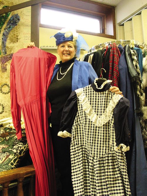 Canstar Community News Oct. 9, 2013 - Margaret Mills shows off a few of the costumes that are being offered for sale following the end of the Headingley United Church Players theatre troupe. (ANDREA GEARY/CANSTAR COMMUNITY NEWS)