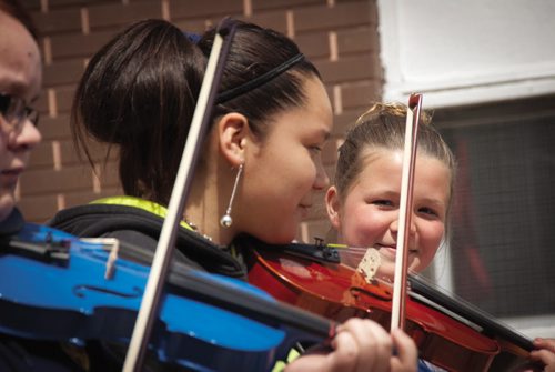 Canstar Community News Oct. 23, 2013 -- Some William Whyte School students are playing violin as part of the Manitoba Conservatory of Music & Arts (MCMA) inner city outreach program.