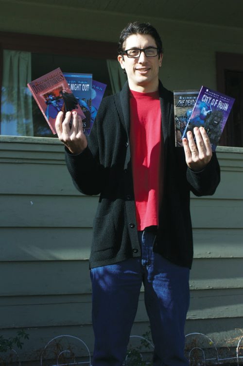 Canstar Community News Oct. 16, 2013 - Novelist A.P. Fuchs is shown with some books from his Axiom-man series, which will have installments six and seven released at the upcoming Central Canada Comic Con. (DAN FALLOON/CANSTAR COMMUNITY NEWS/HERALD)