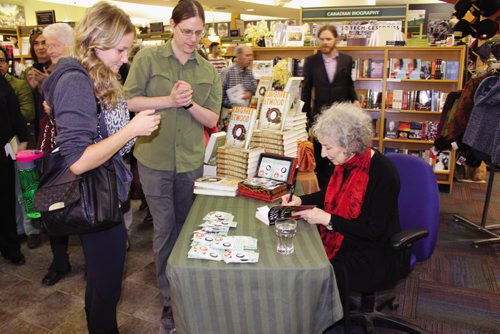 Canstar Community News Renowed poet and novelist Margaret Atwood was in town Oct. 16 at McNally Robinson in Grant Park Mall to greet a long line-up of fans and sign copies of her newest book, MaddAddam. (JORDAN THOMPSON)