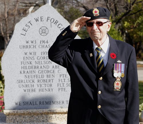 Harvey Friesen salutes at the WW1 WW2  cenotaph  he helped create in Winkler - Harvey Friesen joined the PPCLI at age 16 in 1943 and was  kept in the  service in  Canada until he was 18  but the war had ended preventing him from going over seasto fight. .He lives in Winkler and helped create a WW1 WW2 Cenotaph in the Town of Winkler  - Remembrance Day Feature Äì Mennonite soldiers  who joined the army during WW2 were shunned by their  community upon their return   after WW2 some formed their own church Altona United Church  started in 1953  -Randy Turner story  KEN GIGLIOTTI / Oct. 23 2013 / WINNIPEG FREE PRESS