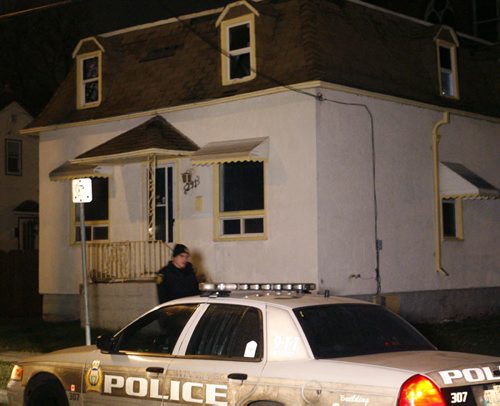 Winnipeg Police and Fire Investigators were at the scene early Thursday morning of a house in the 200 block of Magnus Ave. at Charles St. that was damaged by a fire earlier.     Wayne Glowacki / Winnipeg Free Press Oct. 24 2013