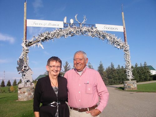 For story about Irvin Goodon, a rags to riches story about a Metis raised in the backwoods who went on to become a multimillionaire.     031 and 034 - Irving and Marge Goodon under the archway decorated with moose and elk antler of the driveway to their home. Bill Redekop / Winnipeg Free Press