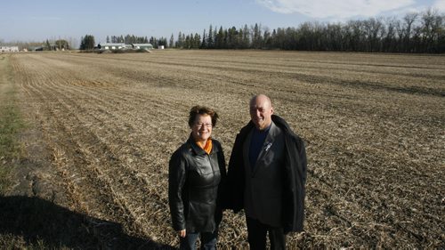 At the future site of the Dugald Estates, a $16-million seniors housing project in Dugald,MB. that will enable local residents to continue to enjoy rural life is Lesley Thomson spokesperson for the project and Jim McCarthy, Reeve of the RM of Springfield. Geoff Kirbyson story. Wayne Glowacki / Winnipeg Free Press Oct. 25 2013