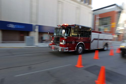 FILE PHOTOS of fire trucks fire dept rushing downtown. BORIS MINKEVICH / WINNIPEG FREE PRESS  October 25, 2013