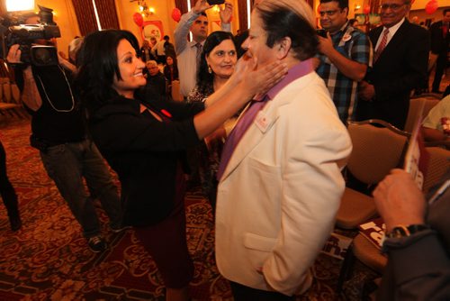 Rana Bokhari rushes to embrace her parents moments after winning the Liberal leadership race at the Hotel Fort Garry Saturday afternoon.  Parents names are - Syed Tahir Bokhari (dad) and Yasmine Bokhari (mom) Ruth Bonneville / Winnipeg Free Press