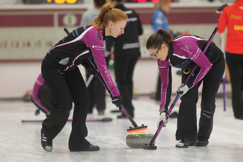 

Kristy McDonald plays with her teammates at the Women's Curling Classic at Fort Rouge Curling Club Saturday afternoon. See Paul Wiecek's story. Ruth Bonneville / Winnipeg Free Press