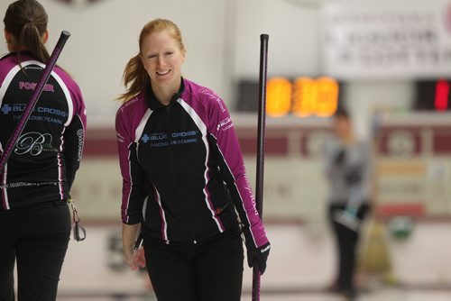 Kristy McDonald plays  with her teammates at the Women's Curling Classic at Fort Rouge Curling Club Saturday afternoon.  See Paul Wiecek's story. Ruth Bonneville / Winnipeg Free Press