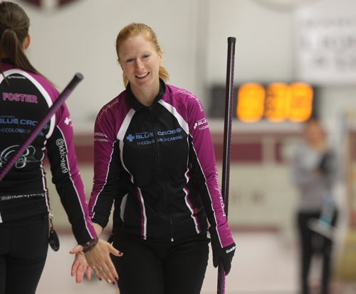 

Kristy McDonald plays with her teammates at the Women's Curling Classic at Fort Rouge Curling Club Saturday afternoon. See Paul Wiecek's story. Ruth Bonneville / Winnipeg Free Press