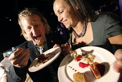 October 25, 2013 - 131025  -    Canadian Olympians Curt Harnett and Susan Auch sample some appetizers at Gold Medal Plates at the Convention Centre Friday, October 25, 2013. Gold Medal Plates is an annual competition that celebrates Canadas culinary stars while raising funds for the Canadian Olympic Foundation. Eight of Winnipegs best chefs -- Timothy Palmer (The Velvet Glove), Eric Lee (Pizzeria Gusto), Kelly Cattani (Elements the Restaurant, by Diversity), Tristan Foucault (Peasant Cookery), Terry Gereta (Mise, Haute Prairie Cuisine), Simon Resch (Terrace in the Park), Michael Schafer (Sydneys at the Forks) and Jason Sopel (Chaise Restaurant & Lounge)-- will be competing John Woods / Winnipeg Free Press